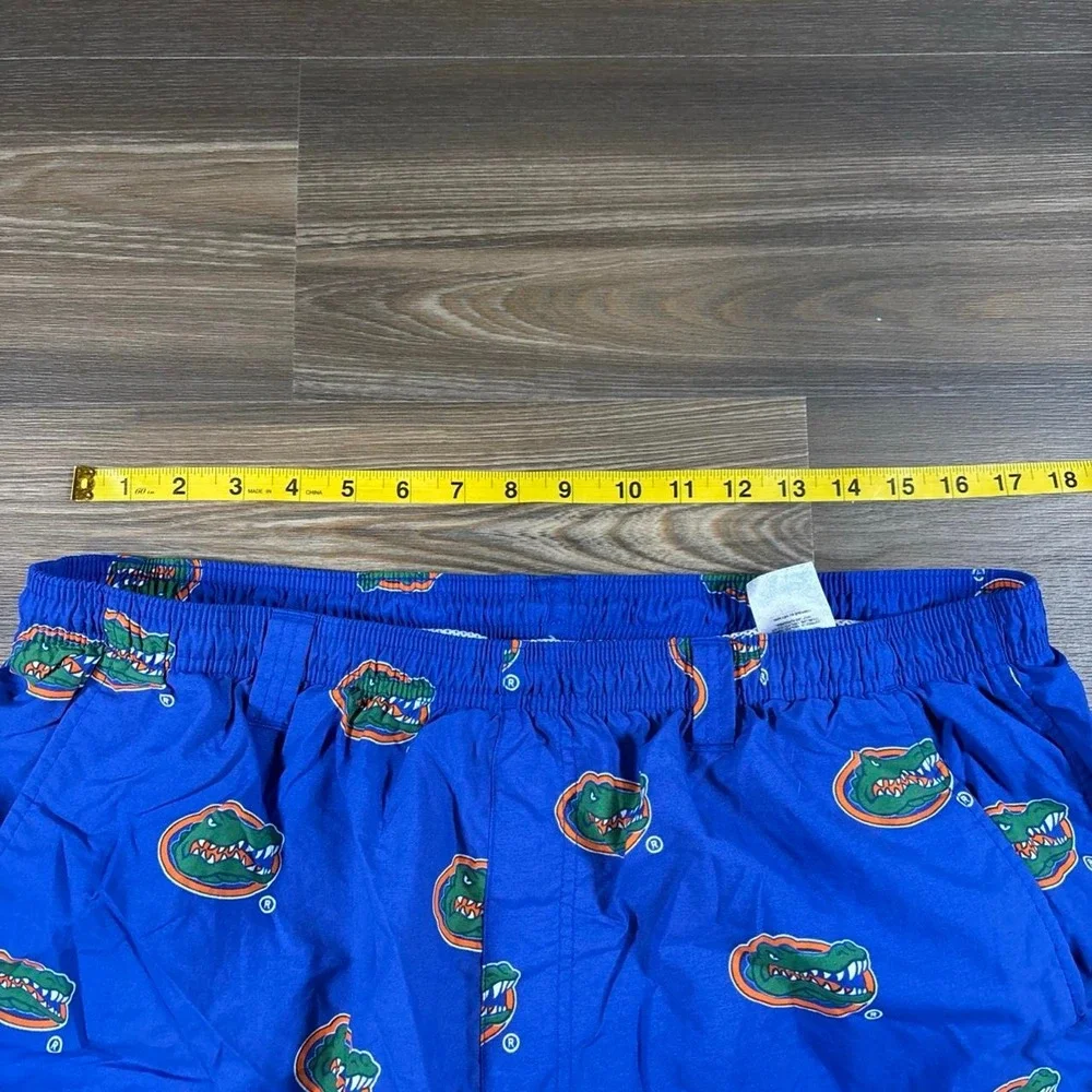Columbia Sportswear Florida Gators blue swim trunks with green alligator logo